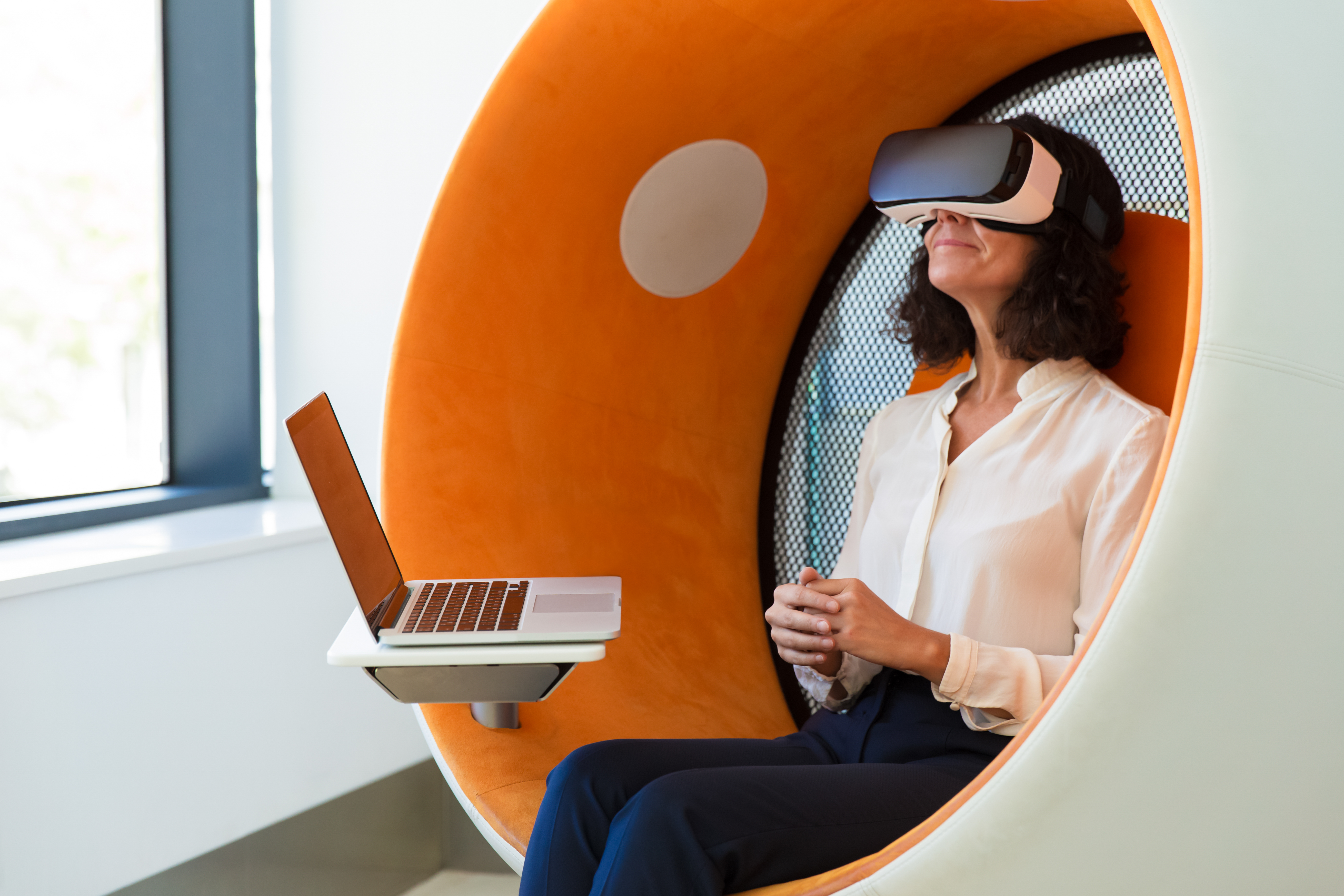 Business woman with virtual reality headset